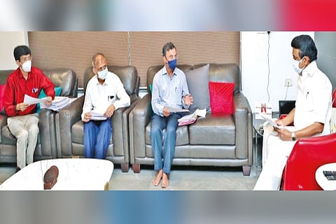 Stalin during a meeting with Rajeev Ranjan and Radhakrishnan on Monday