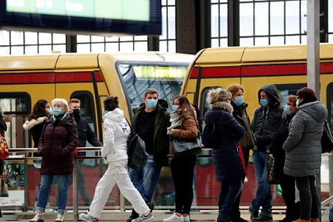 German authorities urge caution ahead of curbs easing