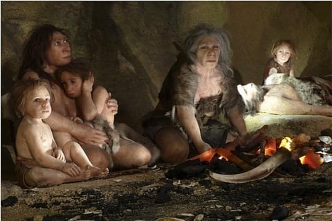 Source: Reuters; An exhibit shows the life of a neanderthal family in a cave