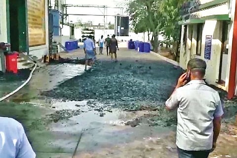 Officials and fire-fighting personnel at the blast site in Cuddalorefactory on Thursday.