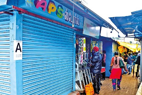 A shop marked with ?A? remains closed as per rotational system in Udhagamandalam