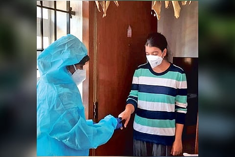 A health worker on triage mission in city on Saturda