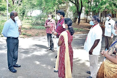 Collector Sivarasu interacting with patients at an isolation centre in Tiruchy on Saturday