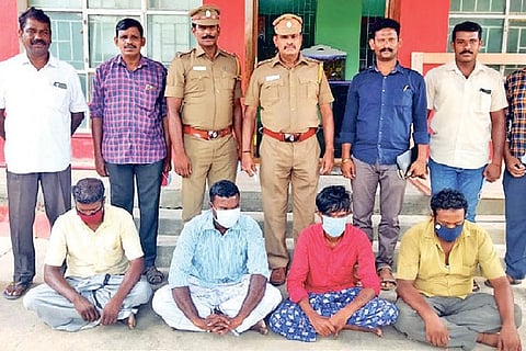 Police along with the arrested gang in Tiruvarur