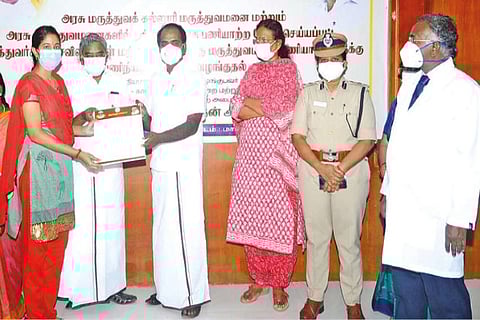 Minister Siva V Meyyappan distributing job orders to candidates in Tiruvarur on Saturday