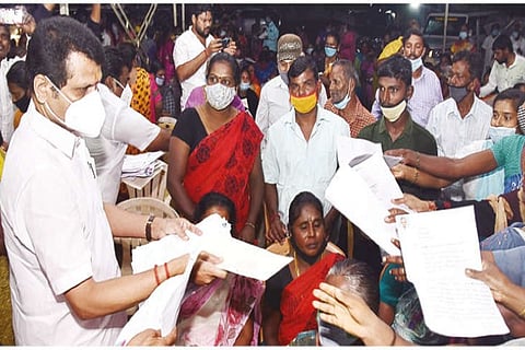 Electricity Minister V Senthilbalaji receiving petitions from the public in Coimbatore on Sunday