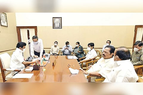 Chief Minister MK Stalin chairing a meeting with ministers to review the flood situation in TN