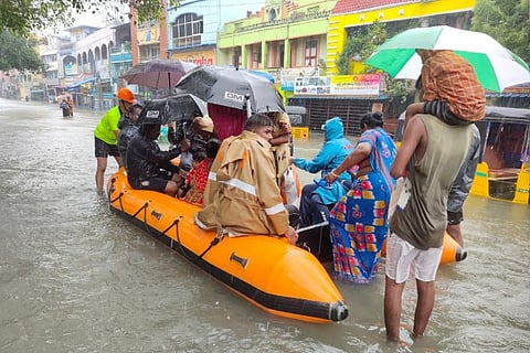 People being rescued by Chennai police from the devastating Chennai floods