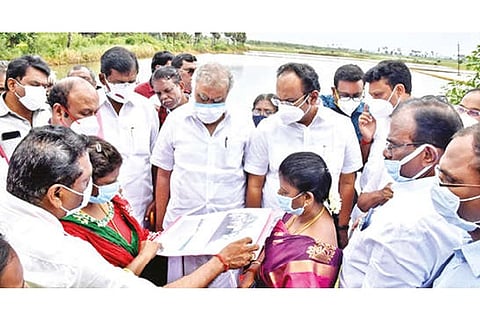 The team of ministers interacts with officials