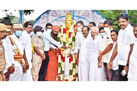 State honour being accorded to the statue of Raja Raja Cholan during the Sadhaya Vizha on Saturday