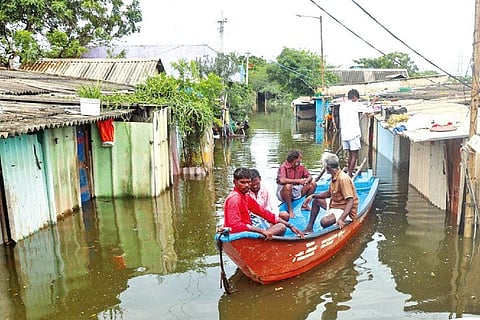 Residents from Manali move safer places by boats after excess water discharge from Poondi reservoir