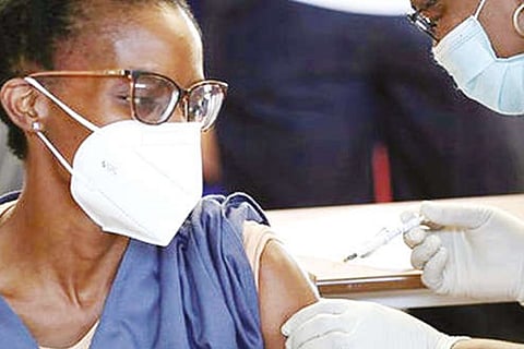 A healthcare worker gives a covid jab (File Photo)