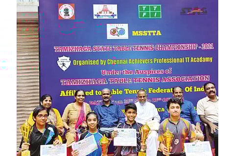 Winners of the Tamizhaga State Table Tennis Championship pose with their trophies