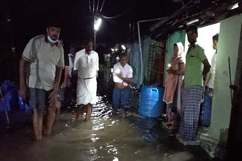MLA  AG Venkatachalam at the flooded Nehru Nagar in Anthiyur in Erode