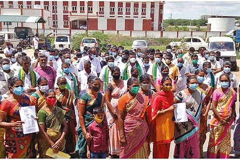Villagers protest against setting up of a steel plant at Tirupur Collectorate on Monday
