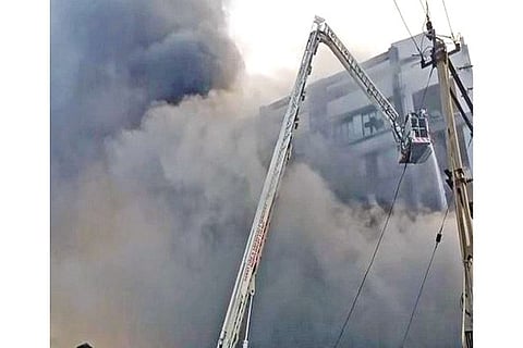 Fire tenders fighting to douse the inferno in Surat packaging unit