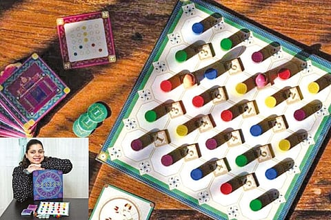 Ettana board game (top), and Madhumita Mani