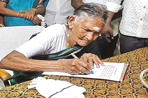 The 90-year-old Perumaathaal, who won in the recent civic polls, signing the register