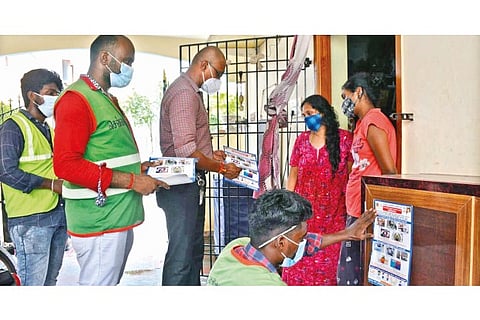 Officials of GCC explaining to remove stagnant water during a door-to-door dengue awareness campaign