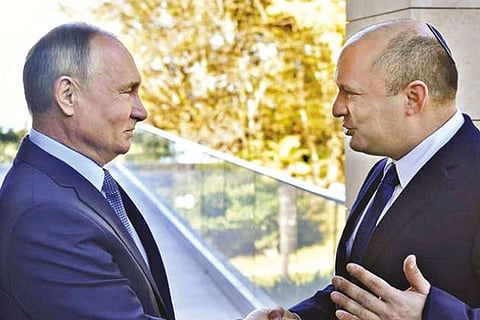 Putin welcomes Bennett at the start of their first meeting in the Black Sea resort of Sochi