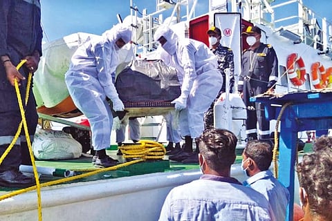 The body of Rajkiran being handed over to the fishermen in mid sea on Saturday by Indian Coast Guard