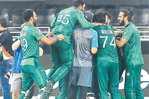 Pakistan?s team members celebrate their victory against India