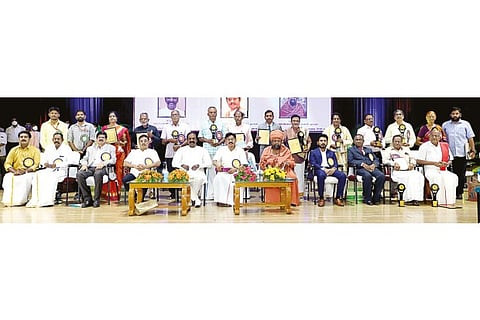The dignitaries and awardees at SRM Tamil Peraayam Awards 2021
