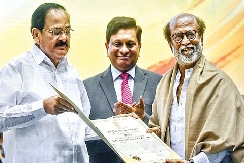 Vice President M Venkaiah Naidu presents the Dadasaheb Phalke Award to Rajinikanth
