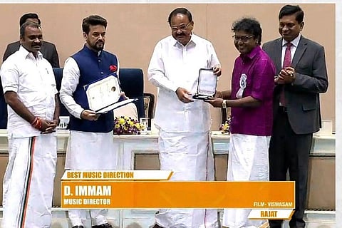 D Imman receiving National Award for Viswasam (Image source: Twitter/D Imman)