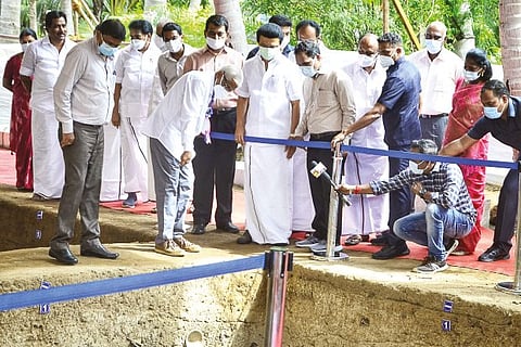 Chief Minister MK Stalin examining an excavation trench along with his cabinet colleagues at Keezhadi