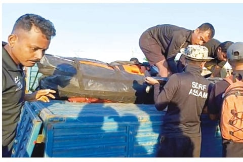 File Photo : Assam SDRF team in action after the boat mishap in the Brahmaputra
