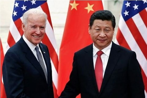 Joe Biden and Xi Jingping (Credit: Reuters)