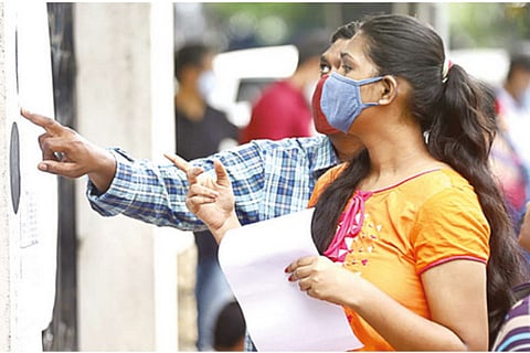 NEET aspirants at Asan Memorial school on Sunday