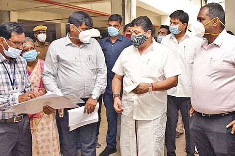 TN FM PTR Palanivel Thiaga Rajan inspecting a vehicle parking station under Smart City Mission.