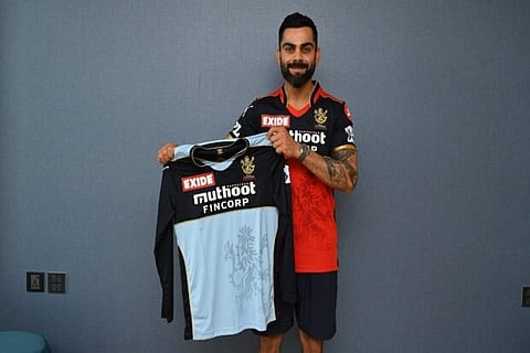 Virat Kohli unveil a blue jersey (Image source: IANS)