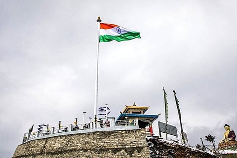 Monumental national flag overlooking the Tawang city (Image Tweeted by @PemaKhanduBJP)