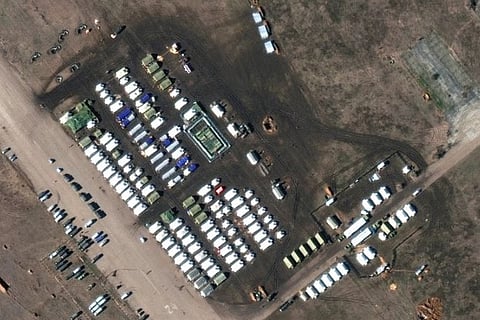 A satellite image show a close-up of troops and equipment at Oktyabrskoye airbase (Image credit: Reu