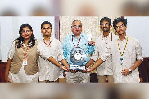 Amrita University students with their mentor after winning the first prize