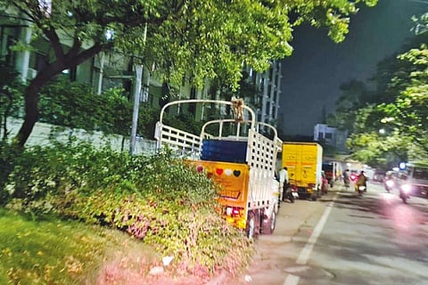 Vehicles parked near an apartment in Tondiarpet