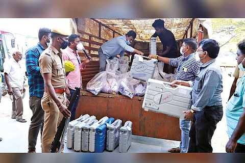 EVMs being downloaded and taken to strongrooms on the eve of elections at Arumbakkam and Broadway in