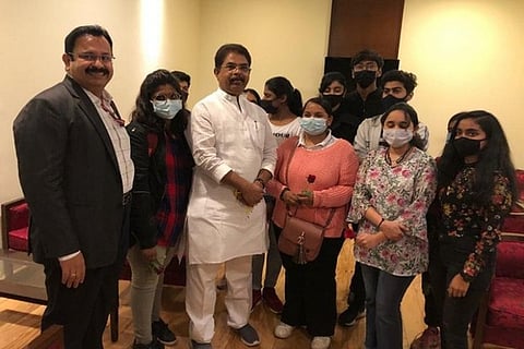 Karnataka Minister R Ashoka with students (Image Courtesy: ANI)