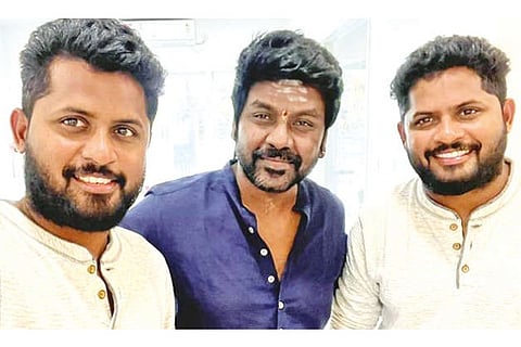 Lawrence (middle) with the directors