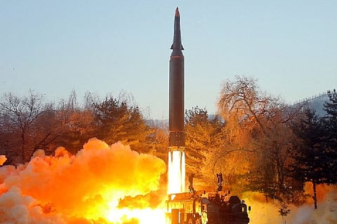 The missile getting launched.