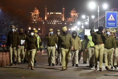 Policemen on patrol at Chandni Chowk during the night curfew in Delhi. (Image credit: PTI)