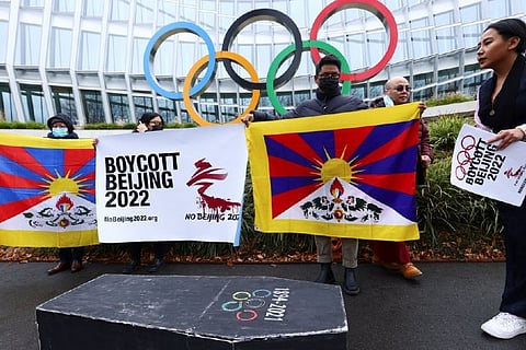 Tibetan activists hold a mock funeral protests against China hosting Winter Olympics. Image: Reuters