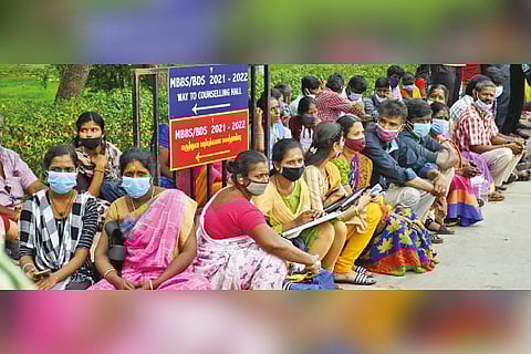 Parents and students waiting for their turn on Friday