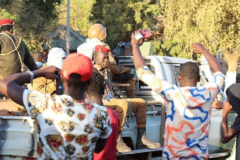 People welcoming the military coup in Burkina Faso. Image Courtesy: Reuters