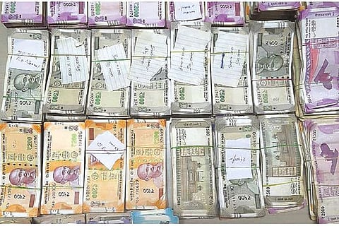 Cash seized from the house of surveyor
