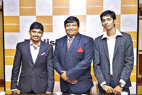 Naveen Valsakumar (Centre)