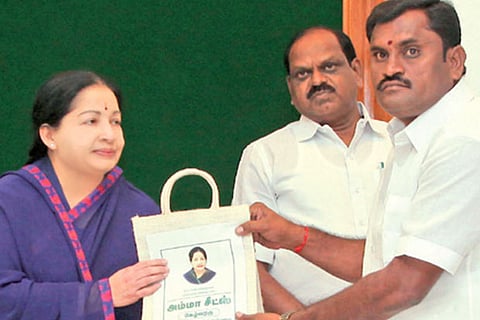CM J Jayalalithaa hands over a seeds kit to a farmer at the Secretariat